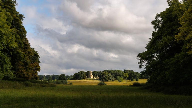View across the parkland towards the Gothic Tower at Wimpole Estate, Cambridgeshire